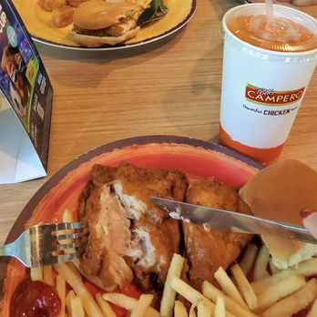 Pollo Campero - Cutting into Two Piece Meal (thigh & drum), French Fries, Drink - Regular - Chicken Shop Near Me - Orlando, Florida Pollo Campero - Cutting into Two Piece Meal (thigh & drum), French Fries, Drink - Regular - Chicken Shop Near Me - Orlando, Florida