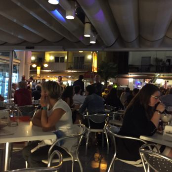 Flora - On the Street. Busy night. - Ice Cream & Frozen Yogurt Near Me - Riva del Garda, Tennessee