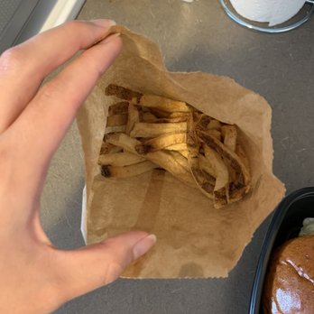 Burger Bar Chicago - Fries come in a small brown bag. This photo does not do the portion size any justice. There is actually a lot of fries - Burgers Near Me - Chicago, Illinois Burger Bar Chicago - Fries come in a small brown bag. This photo does not do the portion size any justice. There is actually a lot of fries - Burgers Near Me - Chicago, Illinois