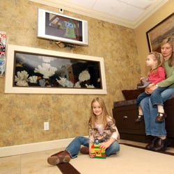 Optima Dental Spa - We cater to families!  Children's corner with aquarium and TV.