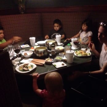 The Melting Pot - Family have fondue - Fondue Near Me - Austin, Texas The Melting Pot - Family have fondue - Fondue Near Me - Austin, Texas