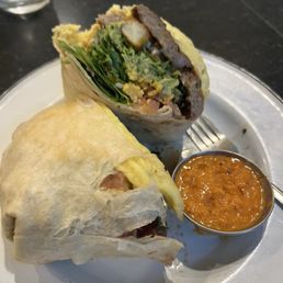 Breakfast burrito plus sausage. Breakfast burrito plus sausage.