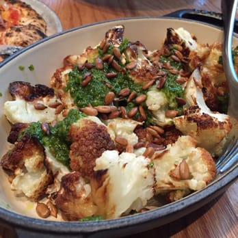 Nightingale - Roasted cauliflower with pine nuts, hazelnuts, sunflower seas and pesto. - Live/Raw Food Near Me - Vancouver, British Columbia
