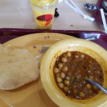 Neehee's Troy, Michigan - Chole bhature comes with two breads, one was already gone! - Indian Near Me - Troy, Michigan Neehee's Troy, Michigan - Chole bhature comes with two breads, one was already gone! - Indian Near Me - Troy, Michigan