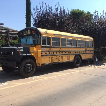 The Escape Bus - The outside of the Blue Bird school bus used for the Escape Bus. - Escape Games Near Me - Lake Forest, California The Escape Bus - The outside of the Blue Bird school bus used for the Escape Bus. - Escape Games Near Me - Lake Forest, California