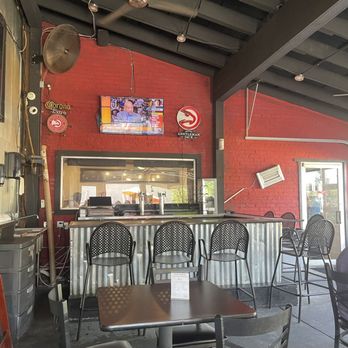 Tom, Dick & Hank - The covered portion of the outside patio - Barbeque Near Me - Atlanta, Georgia Tom, Dick & Hank - The covered portion of the outside patio - Barbeque Near Me - Atlanta, Georgia