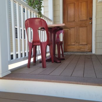 Cafe Metro - a table and two chairs on a porch - Vegetarian Near Me - Denville, New Jersey Cafe Metro - a table and two chairs on a porch - Vegetarian Near Me - Denville, New Jersey
