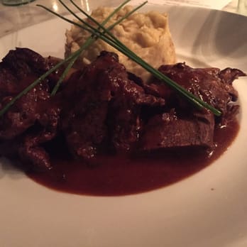 Pylos - Krasata Paidakia  Classic braised short ribs, in spicy xinomavro red wine, served with porcini mushroom potato puree - Greek Near Me - New York, New York