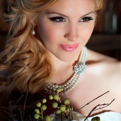 Hair and makeup by the La Vie de Luxe bridal beauty team.