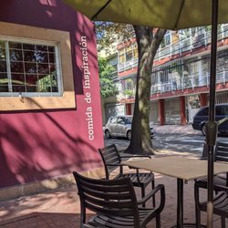 La Casa del Chef - Outdoor seating and sign