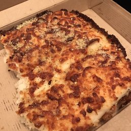 Burnt cheese on dough. Terrible. Burnt cheese on dough. Terrible.