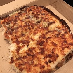 Pizza Hut - Burnt cheese on dough. Terrible.