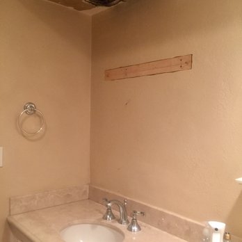 Pinnacle Interiors Drywall - a sink with a hole in the ceiling - General Contractors Near Me - Lakewood, California
