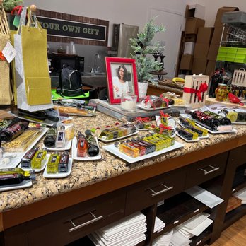 41 Olive - a counter with a variety of food items - Olive Oil Near Me - Mission Viejo, California 41 Olive - a counter with a variety of food items - Olive Oil Near Me - Mission Viejo, California