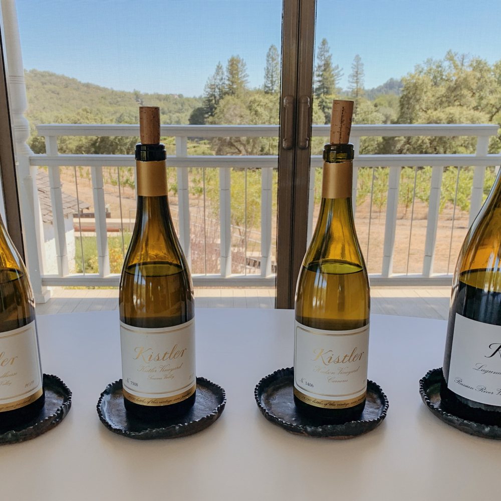 Kistler Vineyards - four bottles of wine on a table - Wineries Near Me - Forestville, California