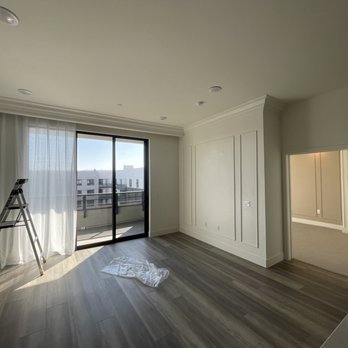 Barcadon - an empty room with a ladder and a window - General Contractors Near Me - Santa Clara, California