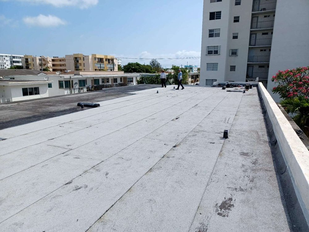 Slide of TK Roofing Contractor Miami