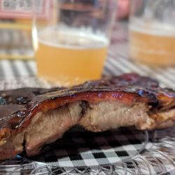 SLAB BBQ & Beer - St Louis pork ribs, brushed with strawberry habanero glaze (not spicy) paired with Zilker Heavenly Daze Hazy IPA
