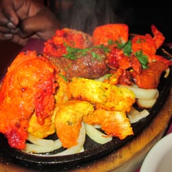 Sitar - Tandoori Dinner($23.95): Tandoori chicken, lamb tikka, chicken tikka, tandoori prawns, seekh kabab, fish tandoori