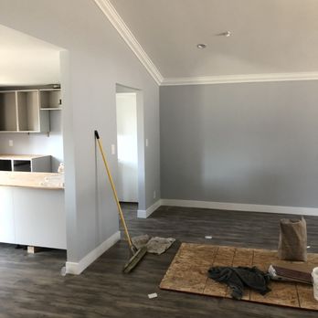 AAA Painting and Flooring - a living room and kitchen - Flooring Near Me AAA Painting and Flooring - a living room and kitchen - Flooring Near Me