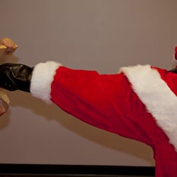 Taekwondo America - santa side kicking