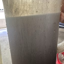 The dirty water after they cleaned!