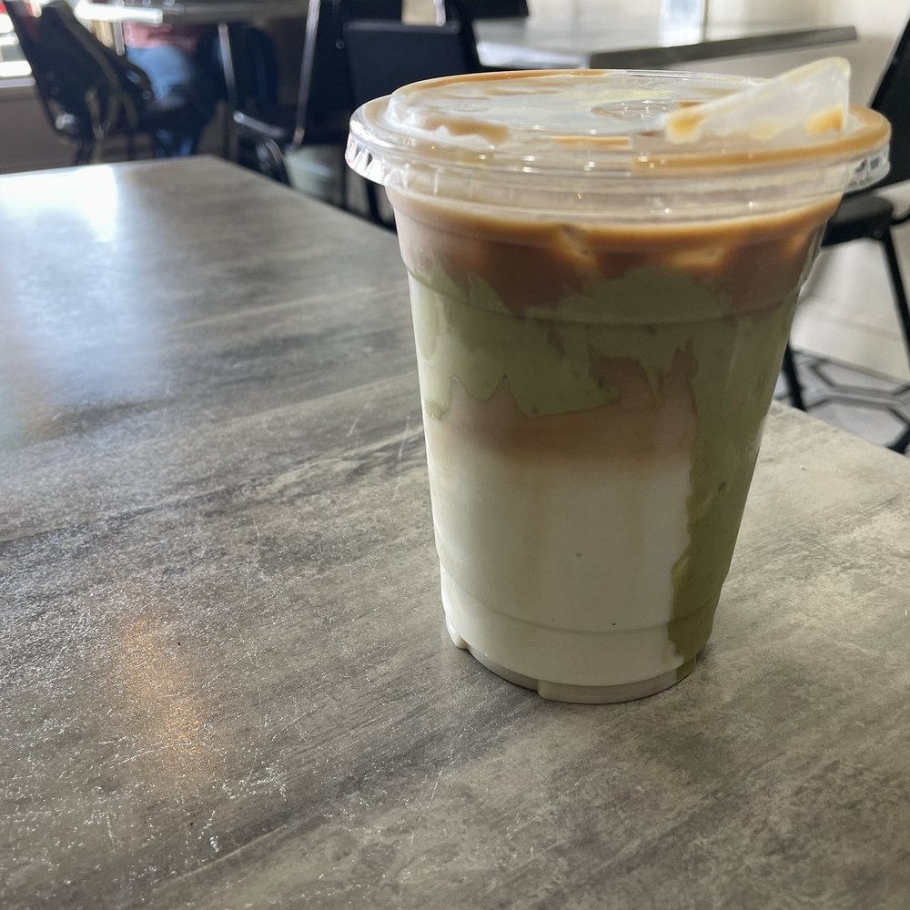 Mokha Cafe - Iced Pistachio Latte - Coffee & Tea Near Me - Bakersfield, California Mokha Cafe - Iced Pistachio Latte - Coffee & Tea Near Me - Bakersfield, California