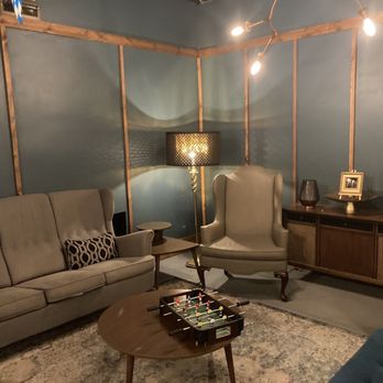 Myrtle Avenue Brewing - a living room with blue walls - Breweries Near Me - Jacksonville, Florida Myrtle Avenue Brewing - a living room with blue walls - Breweries Near Me - Jacksonville, Florida