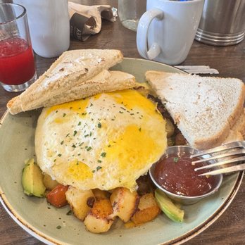 First Watch - Farmhouse Hash well done fried eggs with hasbrowns, avocado, bacon and sourdough bread - Breakfast & Brunch Near Me - Orlando, Florida