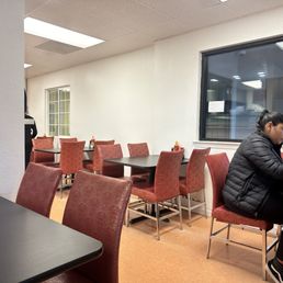 a man sitting at a table a man sitting at a table