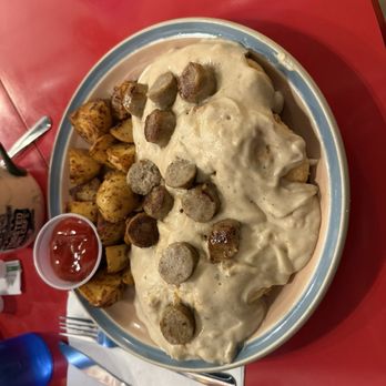 The Toasted Owl Cafe - Biscuits and gravy with breakfast potatoes - Breakfast & Brunch Near Me - Phoenix, Arizona