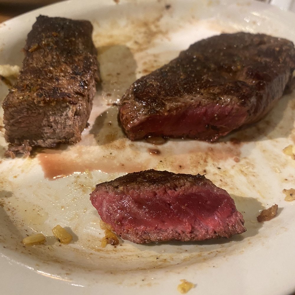 First overcooked strip of meat to the left. On the right was the severely undercooked replacement. First overcooked strip of meat to the left. On the right was the severely undercooked replacement.