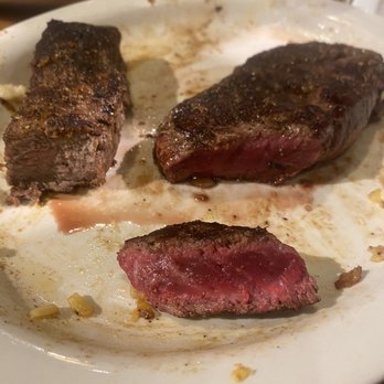 Cracker Barrel Old Country Store - First overcooked strip of meat to the left. On the right was the severely undercooked replacement. - American Near Me - Lancaster, Pennsylvania