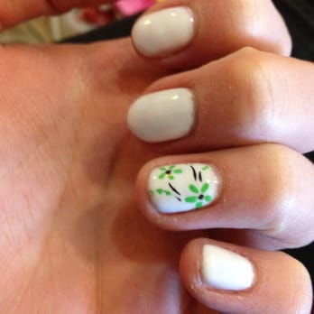 Fossil Spa and Nails - Nail art white shellac she did 3 coats!! Professional at cleaning up my nails beforehand :) - Nail Salons Near Me - Longmont, Colorado