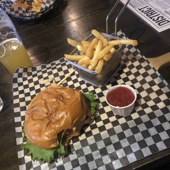 District Taphouse - Burger with soggy bun and tasteless patty. - Poutineries Near Me - New Westminster, British Columbia