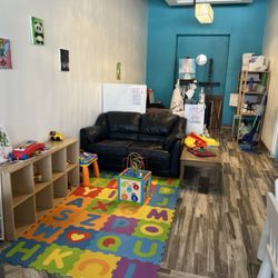 Dragonfly Art Studio - Play area & books from children's reading corner