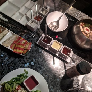 The Melting Pot - Richmond - Select three entree (sweet & spicy shrimp, potstickers & ravioli) and a California salad - Fondue Near Me - Henrico, Virginia The Melting Pot - Richmond - Select three entree (sweet & spicy shrimp, potstickers & ravioli) and a California salad - Fondue Near Me - Henrico, Virginia