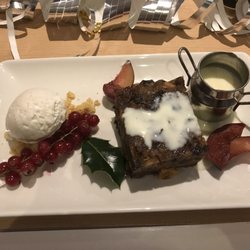 Cruize Bistro - Dessert: homemade Christmas boozy pudding with cinnamon ice cream, mulled plums and brandy sauce