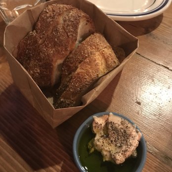 Porto Salvo - bread with ricotta seasoned with olive oil and red pepper - Italian Near Me - Bronx, New York Porto Salvo - bread with ricotta seasoned with olive oil and red pepper - Italian Near Me - Bronx, New York