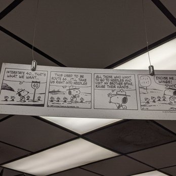 Shell - a comic strip hanging from a ceiling - Gas Stations Near Me - Needles, California
