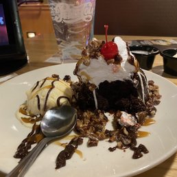 Triple Chocolate Meltdown with pecans, whipped cream and a cherry! Triple Chocolate Meltdown with pecans, whipped cream and a cherry!