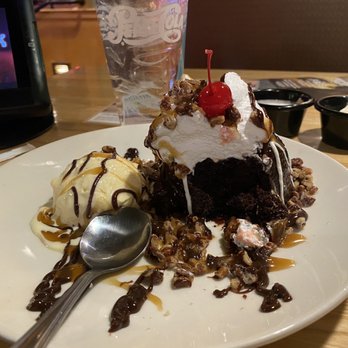 Applebee's Grill + Bar - Triple Chocolate Meltdown with pecans, whipped cream and a cherry! - American Near Me - Carson City, Nevada Applebee's Grill + Bar - Triple Chocolate Meltdown with pecans, whipped cream and a cherry! - American Near Me - Carson City, Nevada