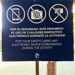 Maroma Beach - Signage of everything photography is forbidden .