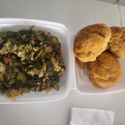 Jamaican Paradise - Callalo and sailfish with fried dumplings