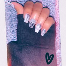 Chris does an amazing job he always makes sure my nails look bomb af I absolutely love this place I don't go anywhere else?!!