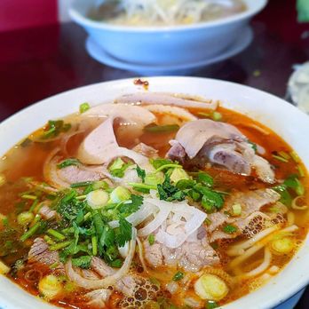 Le Pho - a bowl of soup with meat and vegetables - Vietnamese Near Me - Vancouver, British Columbia Le Pho - a bowl of soup with meat and vegetables - Vietnamese Near Me - Vancouver, British Columbia