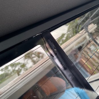Sundown Window Tinting - Bubbles and excess tint dangling - Home Window Tinting Near Me - Cooper City, Florida