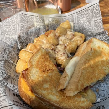 Molly's in Soulard - Parm crusted grilled cheese with loaded tots - Pubs Near Me - St. Louis, Missouri Molly's in Soulard - Parm crusted grilled cheese with loaded tots - Pubs Near Me - St. Louis, Missouri