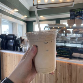 Yigebe Coffee - Someone holding a coffee cup - Coffee & Tea Near Me - Portland, Oregon Yigebe Coffee - Someone holding a coffee cup - Coffee & Tea Near Me - Portland, Oregon