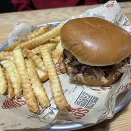 Pulled pork on a bun /w Crinkle-Cut Fries Pulled pork on a bun /w Crinkle-Cut Fries